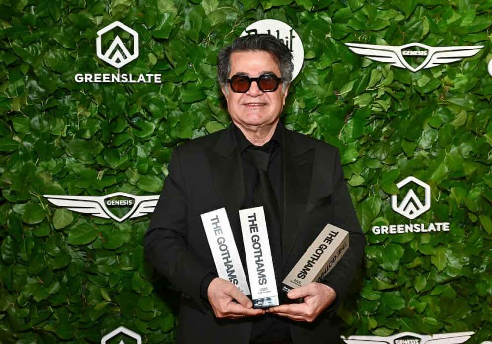 Jafar Panahi poses with the awards for best international feature, best original screenplay and best director at The Gotham Film Awards at Cipriani Wall Street on Monday, Dec. 1, 2025, in New York. (Photo by Evan Agostini/Invision/AP) Associated Press 7 LaPresse Only italy and spain