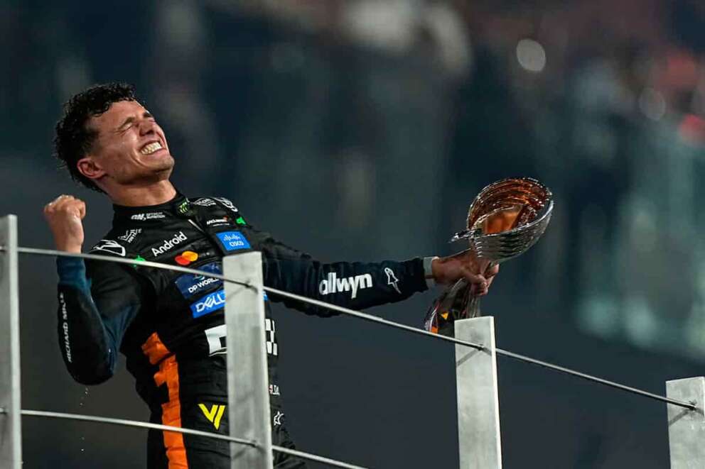McLaren driver Lando Norris of Britain celebrates after becoming a world champion after the Formula One Abu Dhabi Grand Prix at the Yas Marina Circuit in Abu Dhabi, UAE, Sunday, Dec. 7, 2025. (AP Photo/Fatima Shbair)