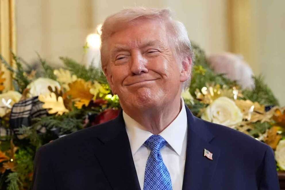 President Donald Trump smiles during a Hanukkah reception in the East Room of the White House, Tuesday, Dec. 16, 2025, in Washington. (AP Photo/Alex Brandon)