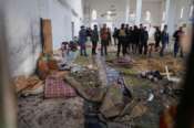Syrian security forces inspect the damage after an explosion in the Imam Ali bin Abi Talib Mosque in a predominantly Alawite area of the Wadi al-Dhahab neighborhood in Homs, Syria Friday, Dec. 26, 2025.(AP Photo)