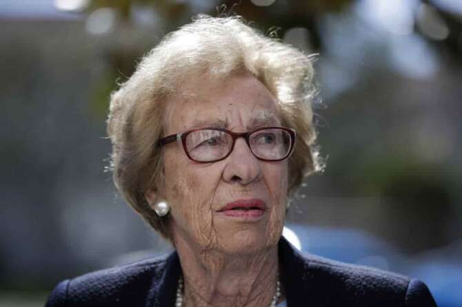 FILE – In this Thursday, March 7, 2019 file photo, Eva Schloss, the stepsister of Anne Frank and a Holocaust survivor, attends a news conference in Newport Beach, Calif. Holocaust survivors around the world are lending their voices to a campaign launched Wednesday July 29, 2020, targeting Facebook head Mark Zuckerberg, urging him to take action to remove denial of the Nazi genocide from the social media site. Eva Schloss is an Auschwitz survivor who today lives in London and has recorded a message for Zuckerberg. (AP Photo/Jae C. Hong, file)