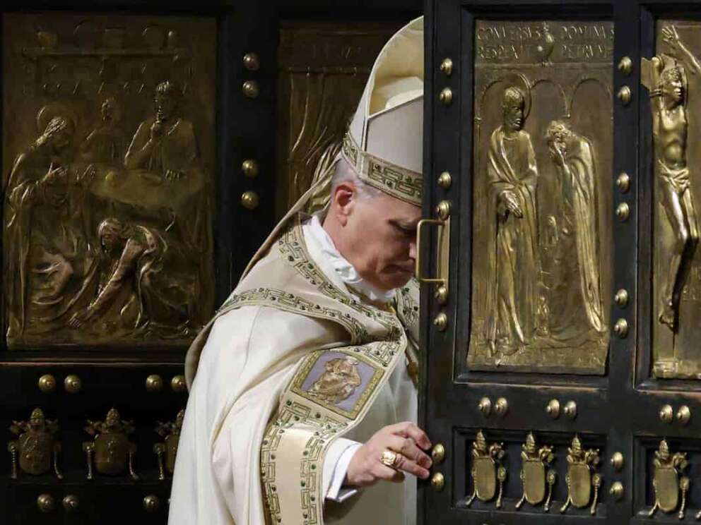 Pope Leo XIV closes St. Peter’s Basilica Holy Door to end the 2025 ordinary Jubilee year, at the Vatican, Tuesday, Jan. 6, 2026. (Yara Nardi/Pool photo via AP)