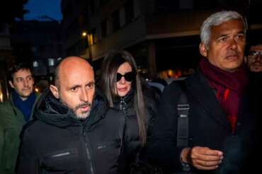 The owners of the “Le Constellation” bar in Crans-Montana, where the deadly fire happened on New Year’s Day, Jacques und Jessica Moretti from France, center, arrive with their lawyers Patrick Michod, Yael Hayat and Nicola Meier, to be auditioned by the Valais public prosecutor’s office in Sion, Switzerland, Friday, January 9, 2026. (Jean-Christophe Bott/Keystone via AP)