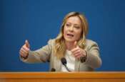 Italian Prime Minister Giorgia Meloni holds her annual start-of-the-year press conference in the press room at the Lower Chamber, in Rome, Friday, Jan. 9, 2026. (AP Photo/Andrew Medichini)