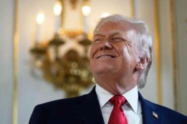 President Donald Trump arrives at a dedication ceremony for a portion of Southern Boulevard, which the Town of Palm Beach Council recently voted to rename,”President Donald J. Trump Boulevard,” Friday, Jan. 16, 2026, at his Mar-a-Lago Club in Palm Beach, Fla. (AP Photo/Julia Demaree Nikhinson)