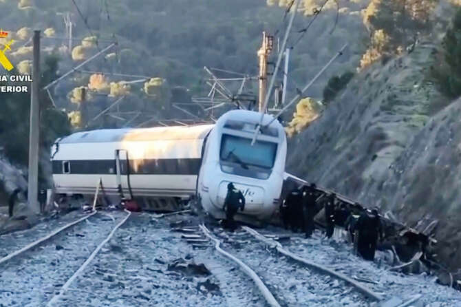 In this grab taken from video provided by Guardia Civil, rescue workers at the scene after a high speed train collision, in Adamuz,  Spain, Monday, Jan. 19, 2026. (Guardia Civil via AP)





Associate Press/ LaPresse
Only Italy and Spain