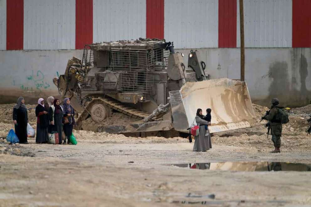 Israeli soldiers check the ID of Palestinians in the West Bank refugee camp of Nur Shams, Tulkarem, as the Israeli military continues its operation in the area on Tuesday, Feb. 11, 2025. (AP Photo/Majdi Mohammed) Associated Press / LaPresse Only italy and Spain