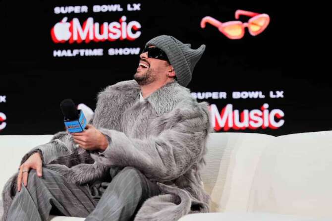 Apple Music Super Bowl LX Halftime Show performer Bad Bunny laughs during a news conference, Thursday, Feb. 5, 2026, in San Francisco ahead of the NFL Super Bowl 60 football game between the Seattle Seahawks and the New England Patriots. (AP Photo/Godofredo A. Vásquez)