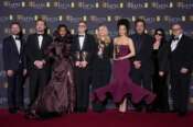 Andy Jurgensen, from left, Leonardo DiCaprio, Teyana Taylor, Paul Thomas Anderson, Sara Murphy, Chase Infiniti, Benicio Del Toro, Cassandra Kulukundis, and Michael Bauman pose with the awards for best director, cinematography, and adapted screenplay for ‘One Battle After Another’ at the 79th British Academy Film Awards, BAFTA’s, in London, Sunday, Feb. 22, 2026. (AP Photo/Alastair Grant)