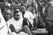 Congo’s former prime minister Patrice Lumumba, center right, with hands tied behind his back, sits in a truck upon arrival at Leopoldville (now Kinshasa) Airport in Congo, Dec. 2, 1960, following his arrest the previous day. On Monday, more than sixty one years after his death, the mortal remains of Congo’s first democratically elected prime minister Patrice Lumumba will be handed over to his children during an official ceremony in Belgium. (AP Photo, File)