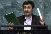 FILE – Iran’s President Mahmoud Ahmadinejad, President of Iran, holds up a copies of the Quran, left, and Bible, right, as he addresses the 65th session of the United Nations General Assembly at U.N. headquarters, Sept. 23, 2010, during a speech where he prompted walkouts from the assembly when he questioned whether the Sept. 11 attacks were staged. (AP Photo/Richard Drew, File) Associated Press/LaPresse