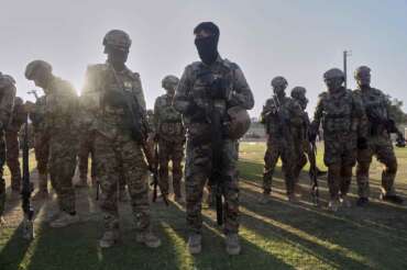 Fighters from the Syrian Democratic Forces (SDF) prepare to attend a military parade before the funeral of senior Kurdistan Workers’ Party (PKK) leader Nuredin Sofi, whose body was returned from Iraq’s Kurdistan region after he was killed in a strike on Mount Gara in April 2021, in Qamishli, northeastern Syria, Tuesday, Aug. 12, 2025. (AP Photo/Baderkhan Ahmad) Associated Press / LaPresse Only italy and spain