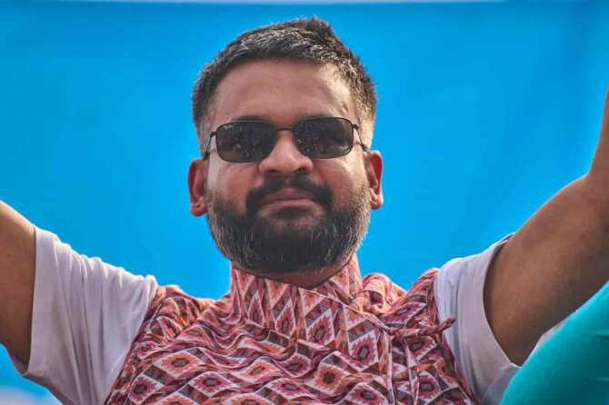 Rapper-turned-politician Balendra Shah, Prime ministerial candidate of the Rastriya Swatantra Party greets his supporters during an election campaign rally in Chitwan, about 112 miles (180 kilometers) west of Kathmandu, Nepal, Friday, Feb. 27, 2026. (AP Photo/Niranjan Shrestha)