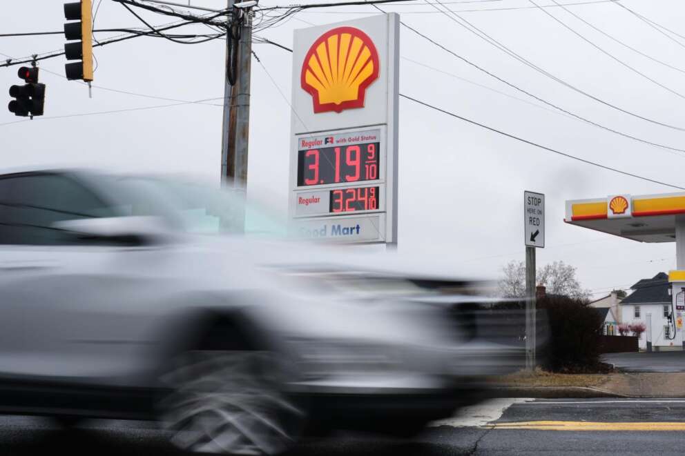 Fuel prices are displayed at a gas station as cars drive by, Wednesday, March 4, 2026, in Baltimore. (AP Photo/Stephanie Scarbrough)