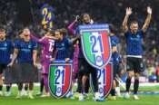 Inter players celebrate the victory of their 21st championship after a Serie A soccer match between Inter Milan and Parma, in Milan, Italy, Sunday, May 3, 2026. (AP Photo/Luca Bruno) Associate Press/ LaPresse Only Italy and Spain