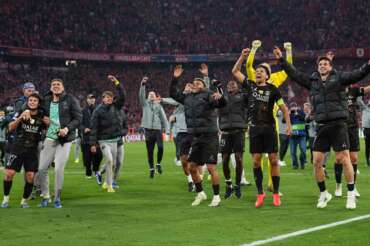 PSG players celebrate after the Champions League semifinal second leg soccer match between Bayern Munich and Paris Saint Germain in Munich, Germany, Wednesday, May 6, 2026. (AP Photo/Martin Meissner)