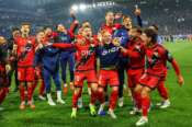 Rayo Vallecano players celebrate their victory at the Conference League semifinal second leg soccer match between Strasbourg and Rayo Vallecano, in Strasbourg, eastern France, Thursday, May 7, 2026. (AP Photo/Antonin Utz)