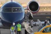Passengers board a plane bound for Eindhoven, after disembarking from the hantavirus-stricken cruise ship MV Hondius at the airport in Tenerife, Canary Islands, Spain, Monday, May 11, 2026. (AP Photo/Arturo Rodriguez) Associated Press / LaPresse Only italy and spain