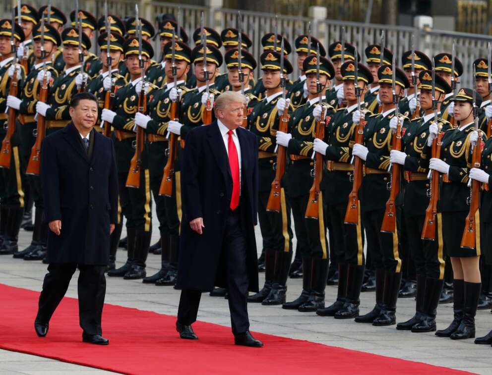AP Photo/Andy Wong, File