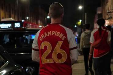 An Arsenal supporter leaves the Arsenal fan celebration after Arsenal’s soccer team won the Premier League title in London, Tuesday, May 19, 2026.(AP Photo/Alberto Pezzali)