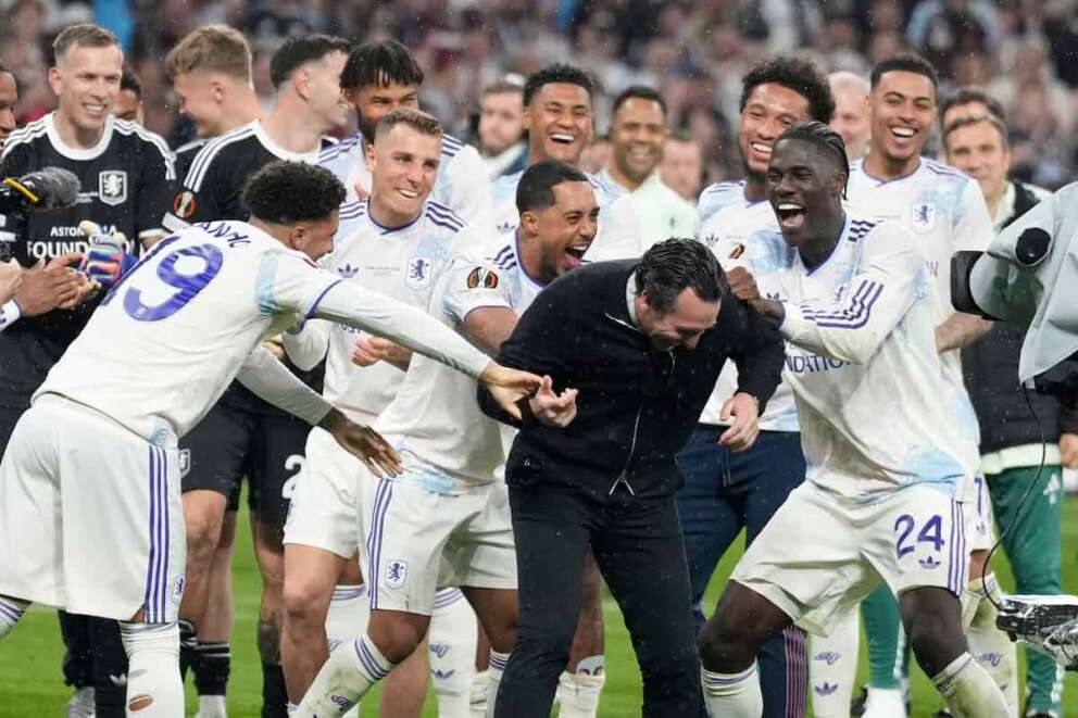 Aston Villa’s head coach Unai Emery celebrates with players after the Europa League final soccer match between Freiburg and Aston Villa in Istanbul, Turkey, Thursday, May 21, 2026. (AP Photo/Emrah Gurel)