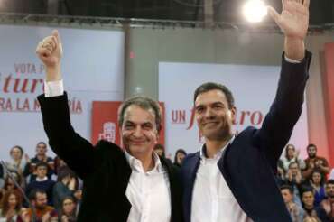 Spanish Socialist Workers Party (PSOE) leader Pedro Sanchez (R), presidential candidate for the upcoming general elections, and former Spanish Prime Minister Jose Luis Rodriguez Zapatero (L), react during an election campaign event in Gijon, northern Spain, 10 December 2015. Spain will hold a general election on 20 December 2015. EFE/J.L. Cereijido