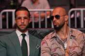 Andrew Tate, right, and his brother Tristan arrive before President Donald Trump to attend UFC 327 at Kaseya Center, Saturday, April 11, 2026, in Miami. (AP Photo/Julia Demaree Nikhinson, Pool)