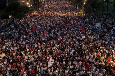 Protesters take part in a rally in Tirana, Albania, Tuesday, June 9, 2026, against the construction of a massive coastal development project linked to Jared Kushner and Ivanka Trump at Narta lagoon area, western Albania. (AP Photo/Hameraldi Agolli)