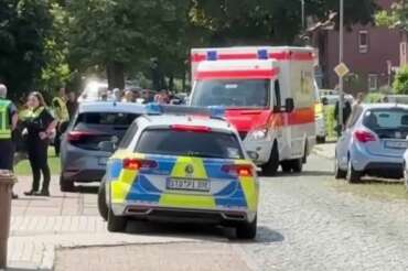 In this image taken from a video, emergency responders, residents and police in Stade, Germany, Monday, June 29, 2026 after five people were killed in a shooting on Monday at a youth welfare facility in the northern German town of Stade, police said. (NWM-TV via AP) Associate Press/ LaPresse Only Italy and Spain