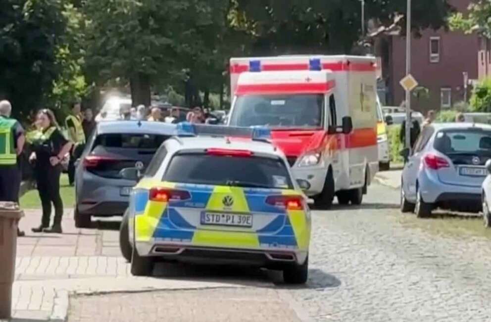 In this image taken from a video, emergency responders, residents and police in Stade, Germany, Monday, June 29, 2026 after five people were killed in a shooting on Monday at a youth welfare facility in the northern German town of Stade, police said. (NWM-TV via AP) Associate Press/ LaPresse Only Italy and Spain